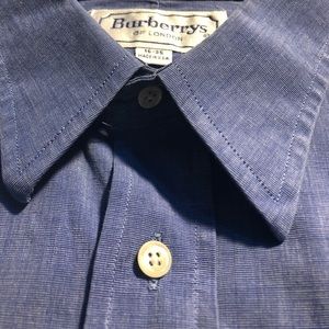 Burberry’s men’s used blue bottom down shirt.